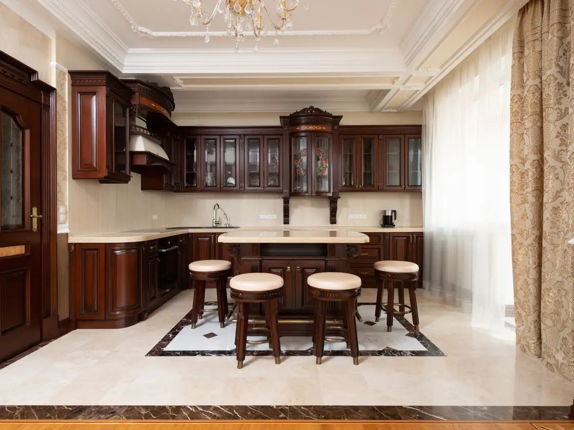 Made-to-measure kitchen in a period Surrey home with warm dark cabinetry, aged-brass hardware and a large quartz island